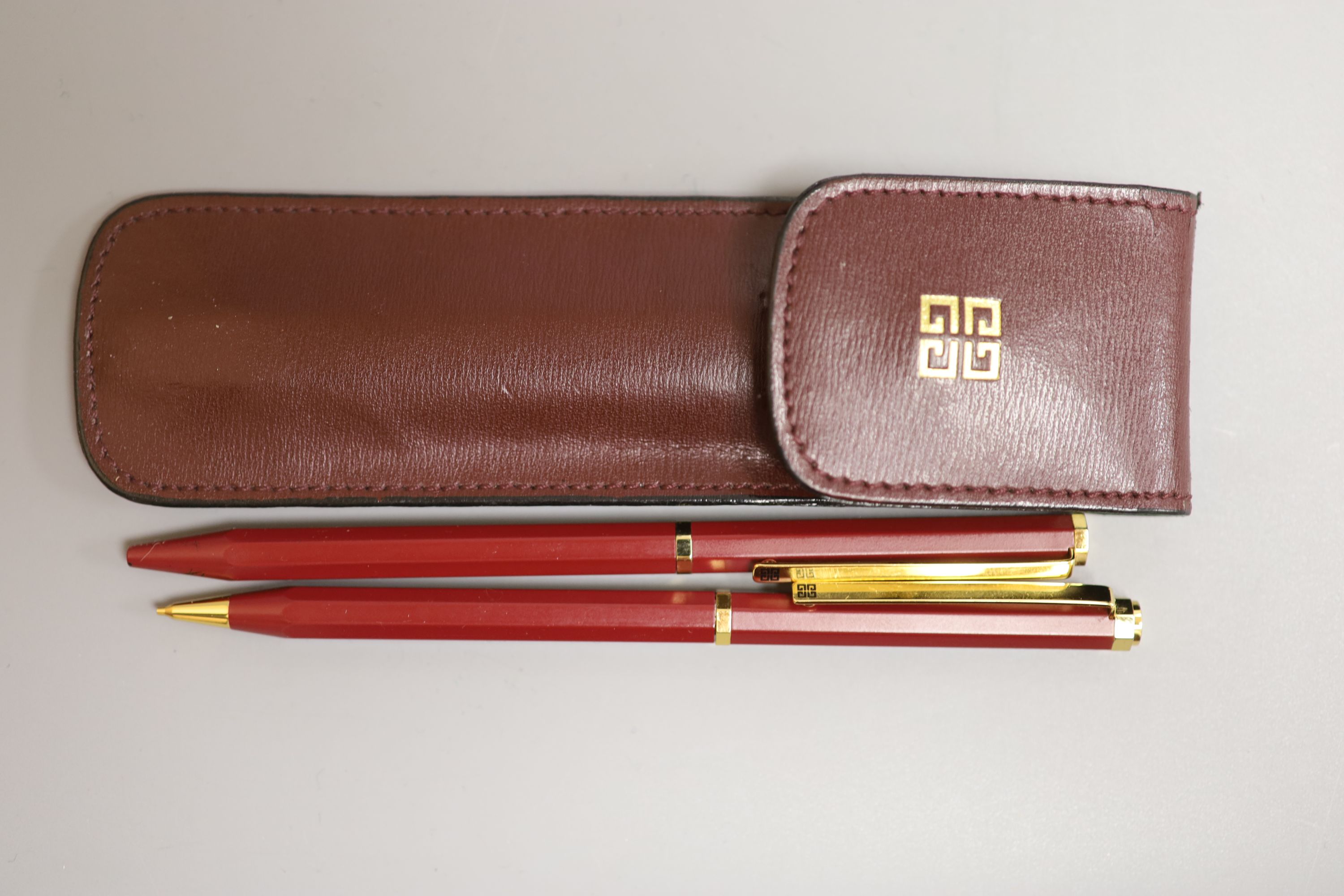 A Dupont Vermeil and blue lacquer ball pen and other pens